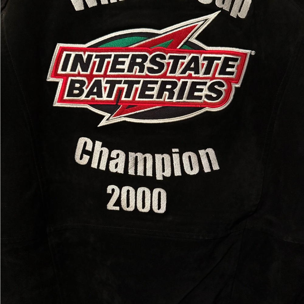 Hamilton Black Bomber Jacket with Varsity Style
Embroidered patches